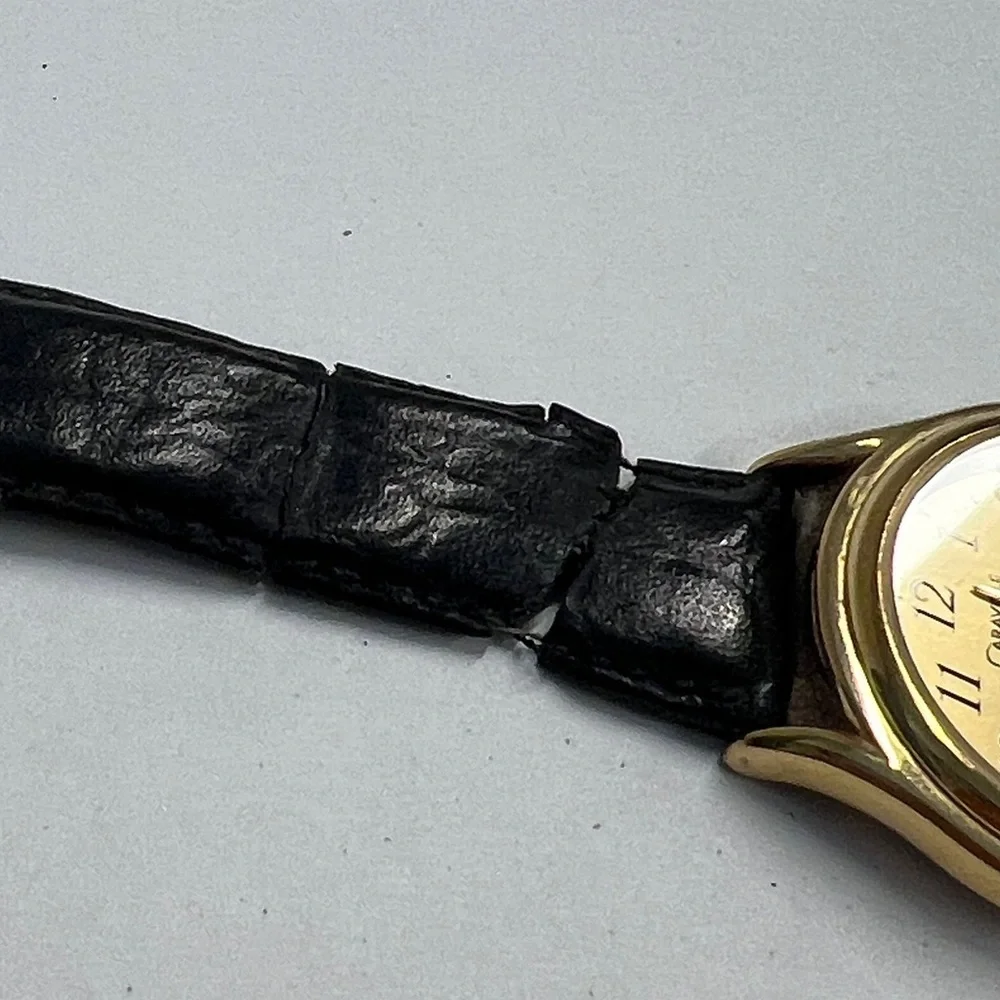 Caravelle by Bulova Vintage Quarts Watch Day Date Second Hand Function